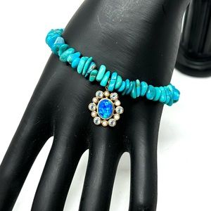 14K floral pendant, turquoise beaded bracelet